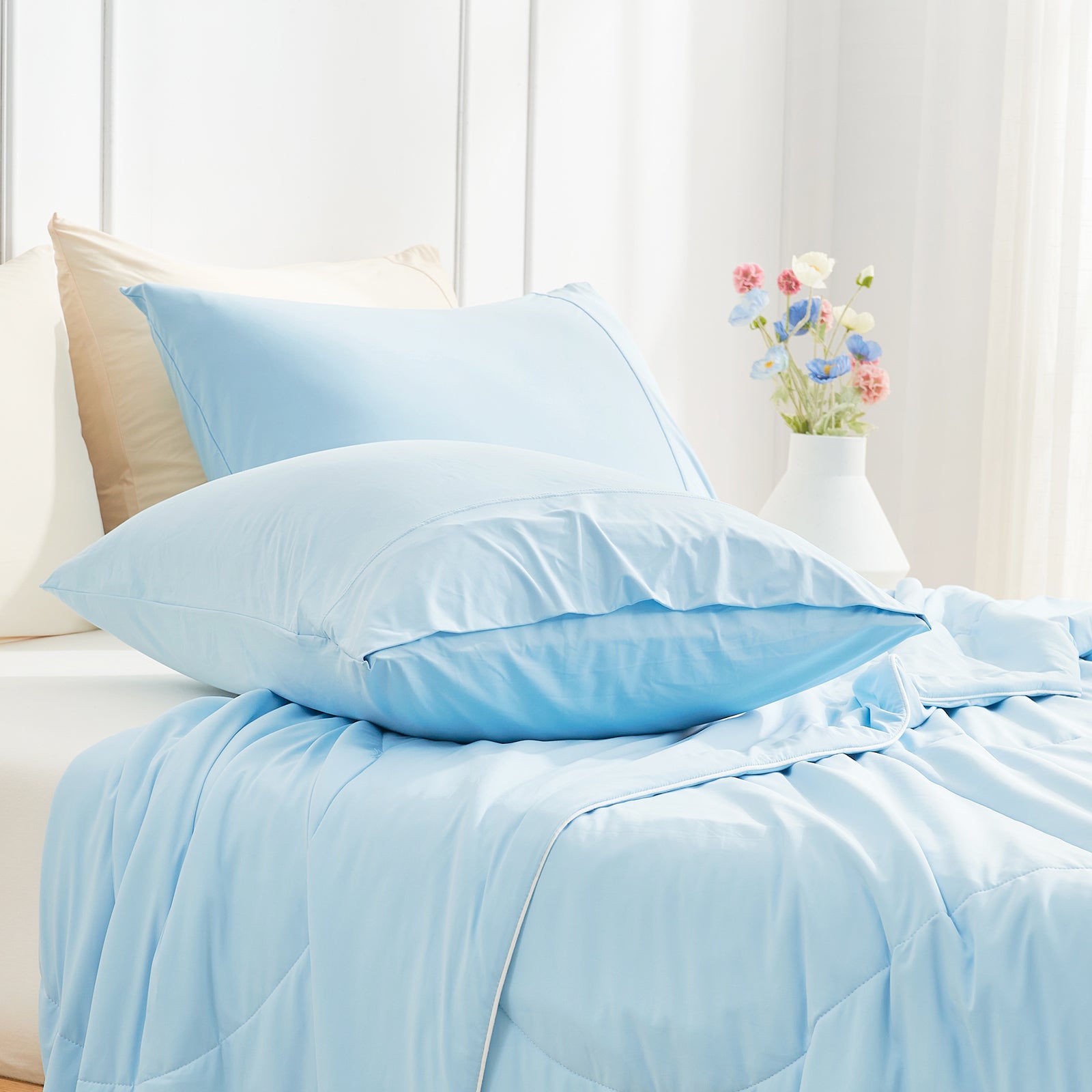 Cooling Pillowcases on bed, blue color, soft and breathable #color_Sky Blue