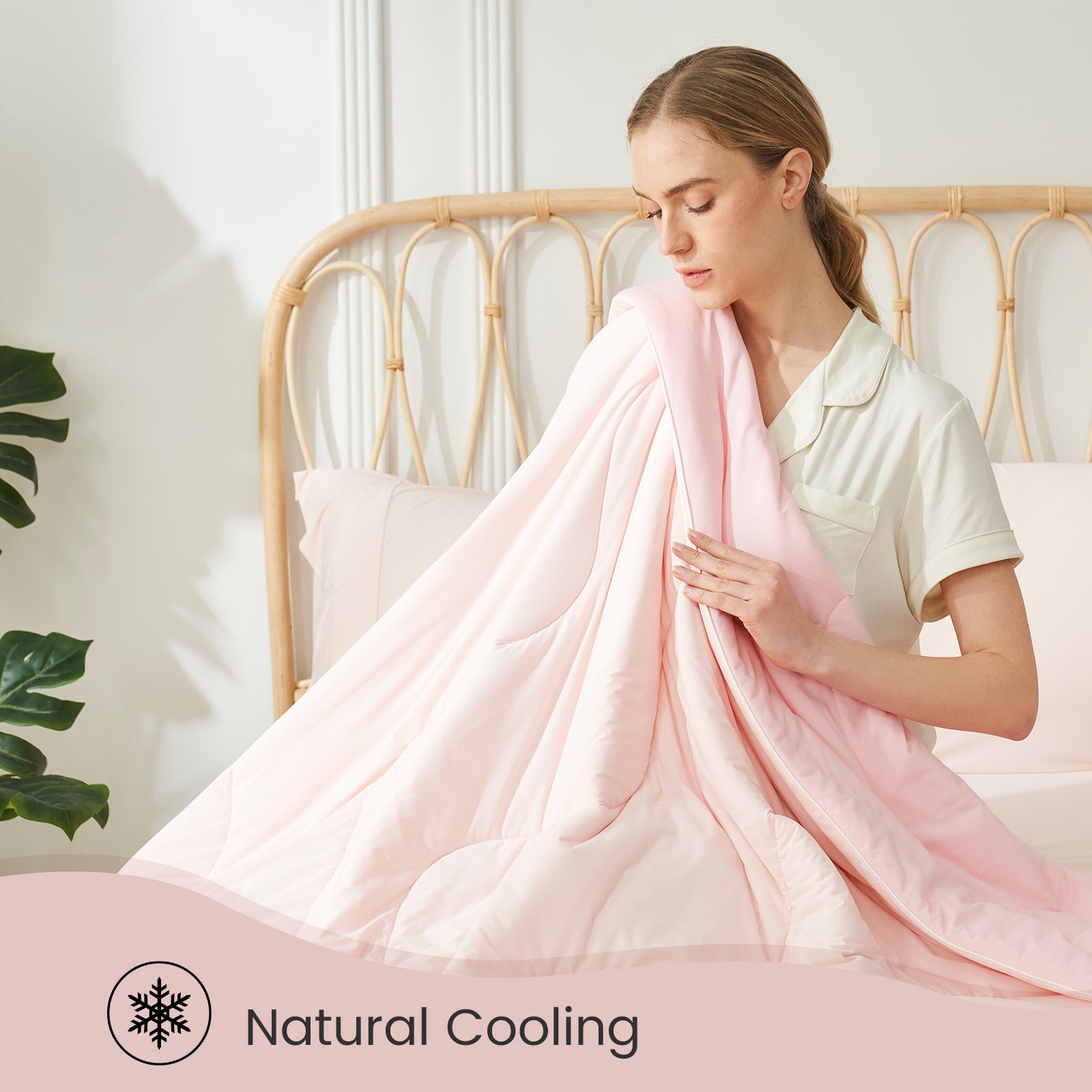 Cozy Bliss cooling comforter, pink, highlighting 'Natural Cooling' and breathability for a cool sleep. #color_Cool Pink