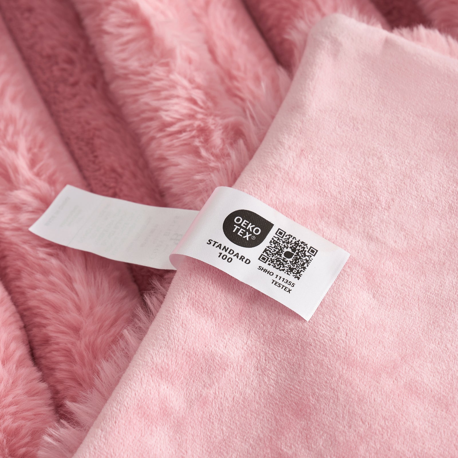 Cozy Bliss pink faux fur blanket with Oeko-Tex Standard 100 label, soft and cozy bedding #color_Hot Pink