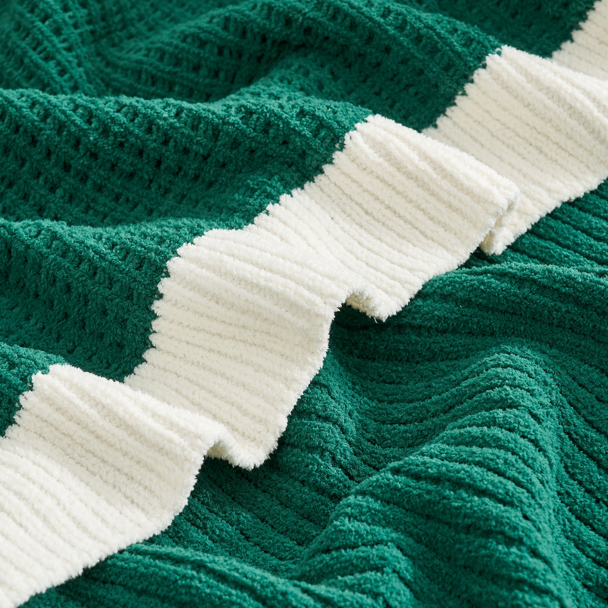 Close-up of Chenille Waffle Knit Throw Blanket in Green highlighting plush chenille yarn and breathable knit. #color_Green