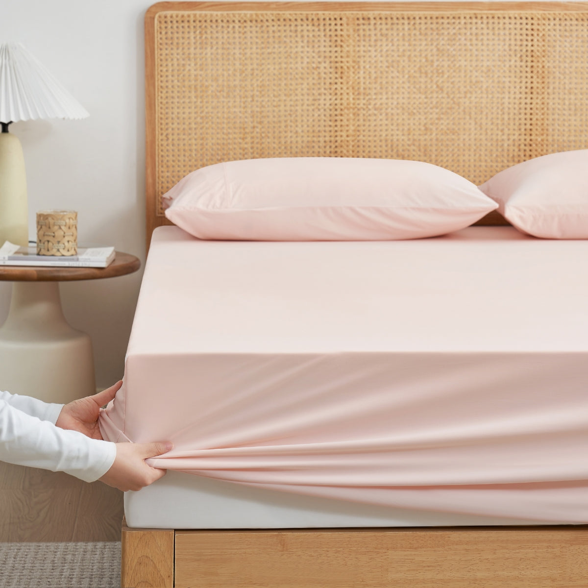 Cozy Bliss Cream-colored cooling fitted sheet set with pillowcases front view. #Color_Pink