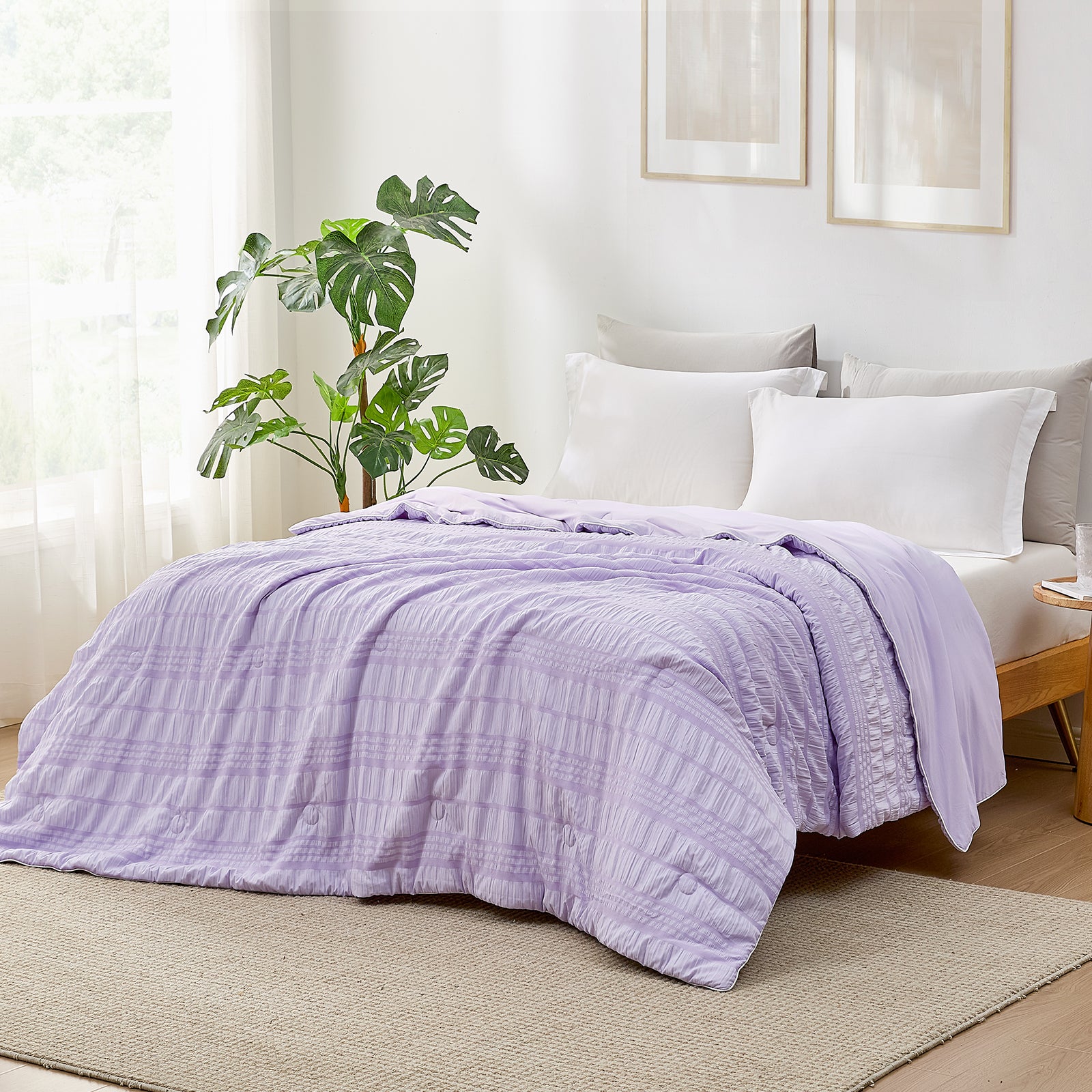 Cozy Bliss Lavender Cooling Comforter on bed, seersucker design for cool sleep. Soft, breathable blanket. #color_Purple