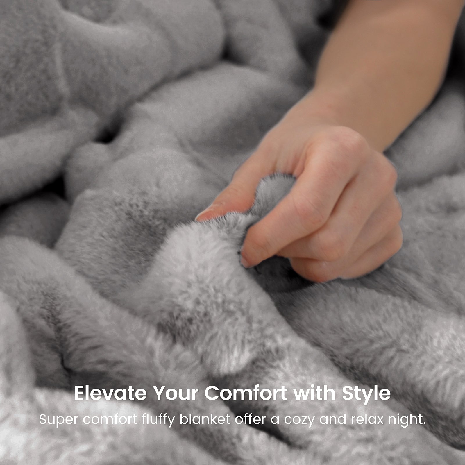 Gray fuzzy blanket with hand touching, cozy blanket for ultimate comfort, offering a relax night. #color_Grey