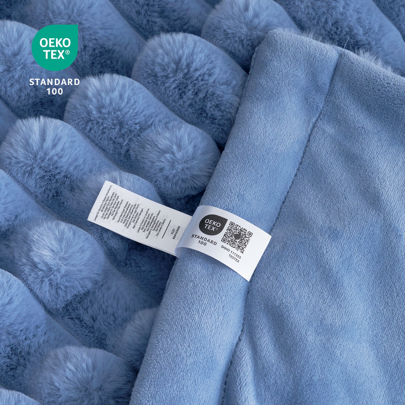 Blue Cozy Bliss faux fur blanket, Oeko-Tex Standard 100 certified for quality and comfort, cozy bedding. #color_Light Blue