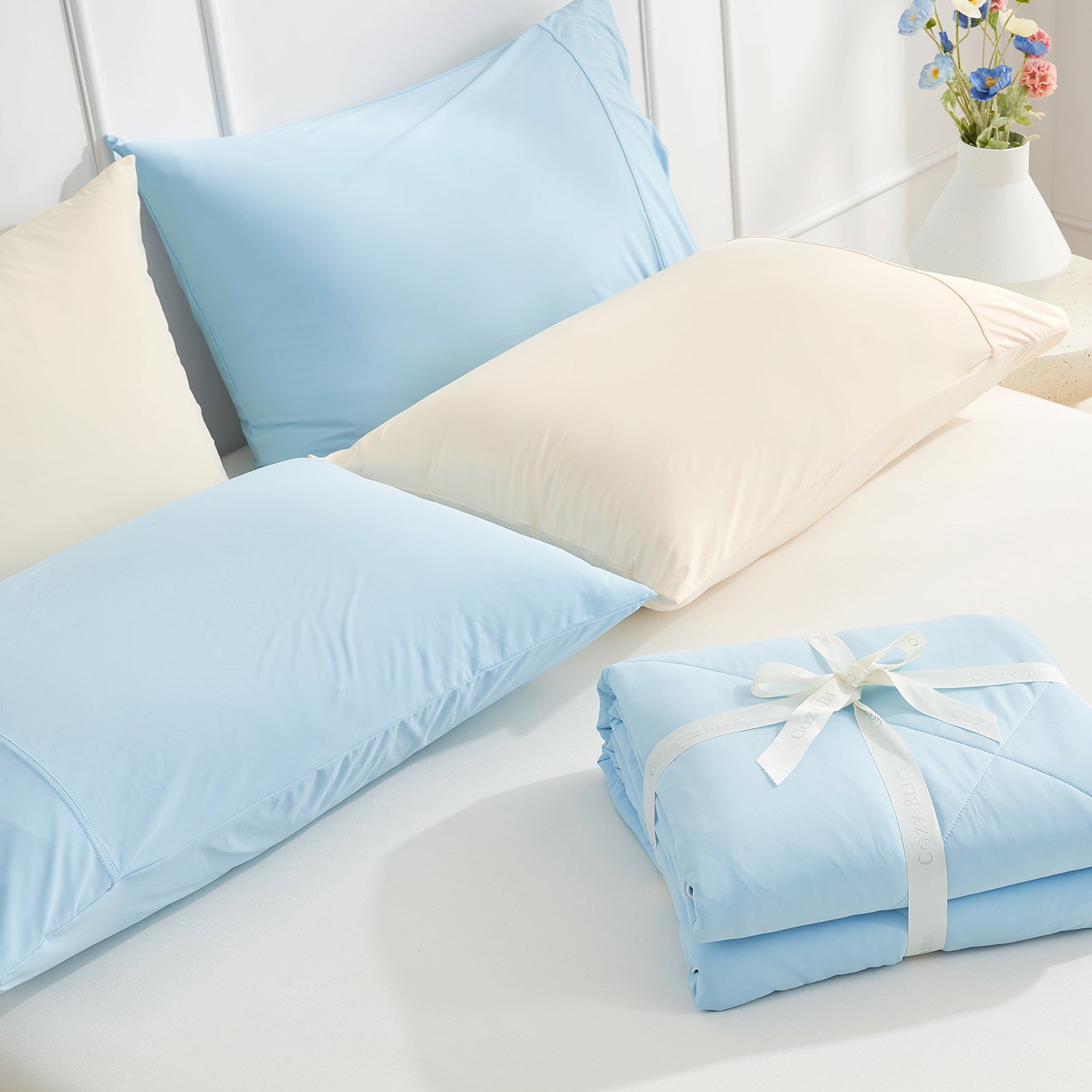 Cozy Bliss Cooling Pillowcases in Cream and Blue #color_Sky Blue