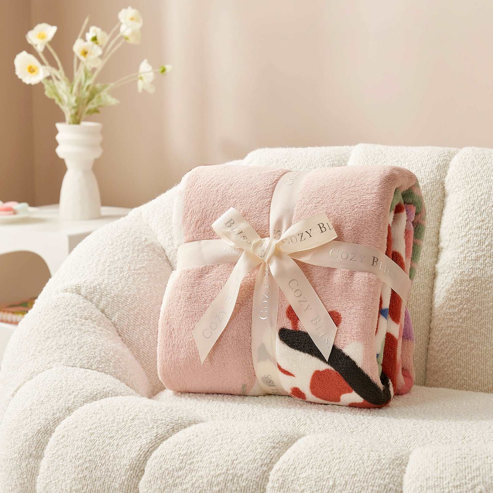 Cozy Bliss children's fleece throw blanket, pink, tied with a ribbon #color_Jungle Rhapsody