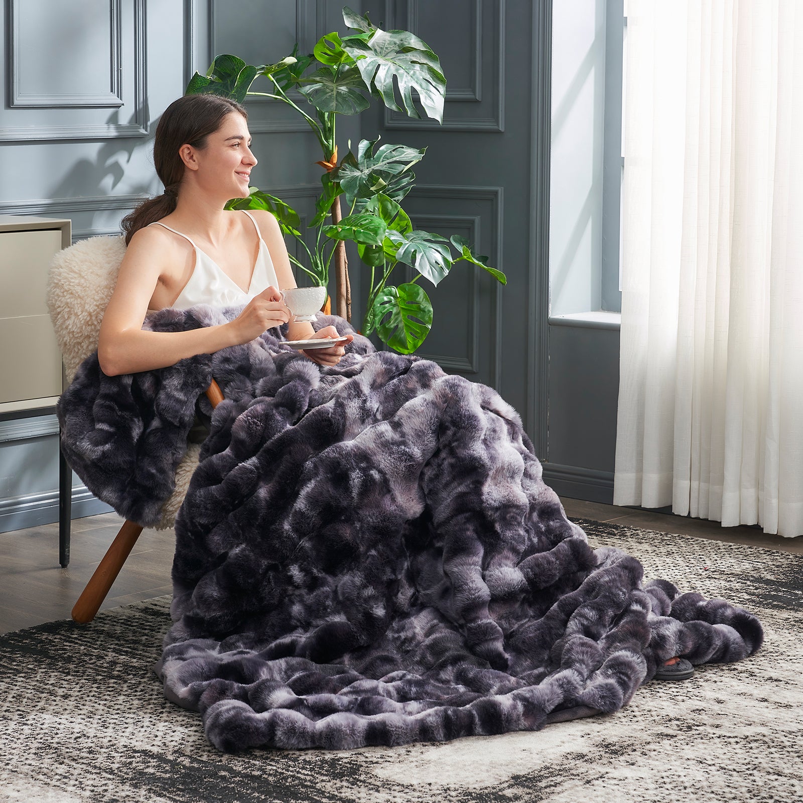 Cozy Bliss gray tie-dye faux fur throw blanket, woman relaxing with tea, soft blanket #color_Tie-dye Black