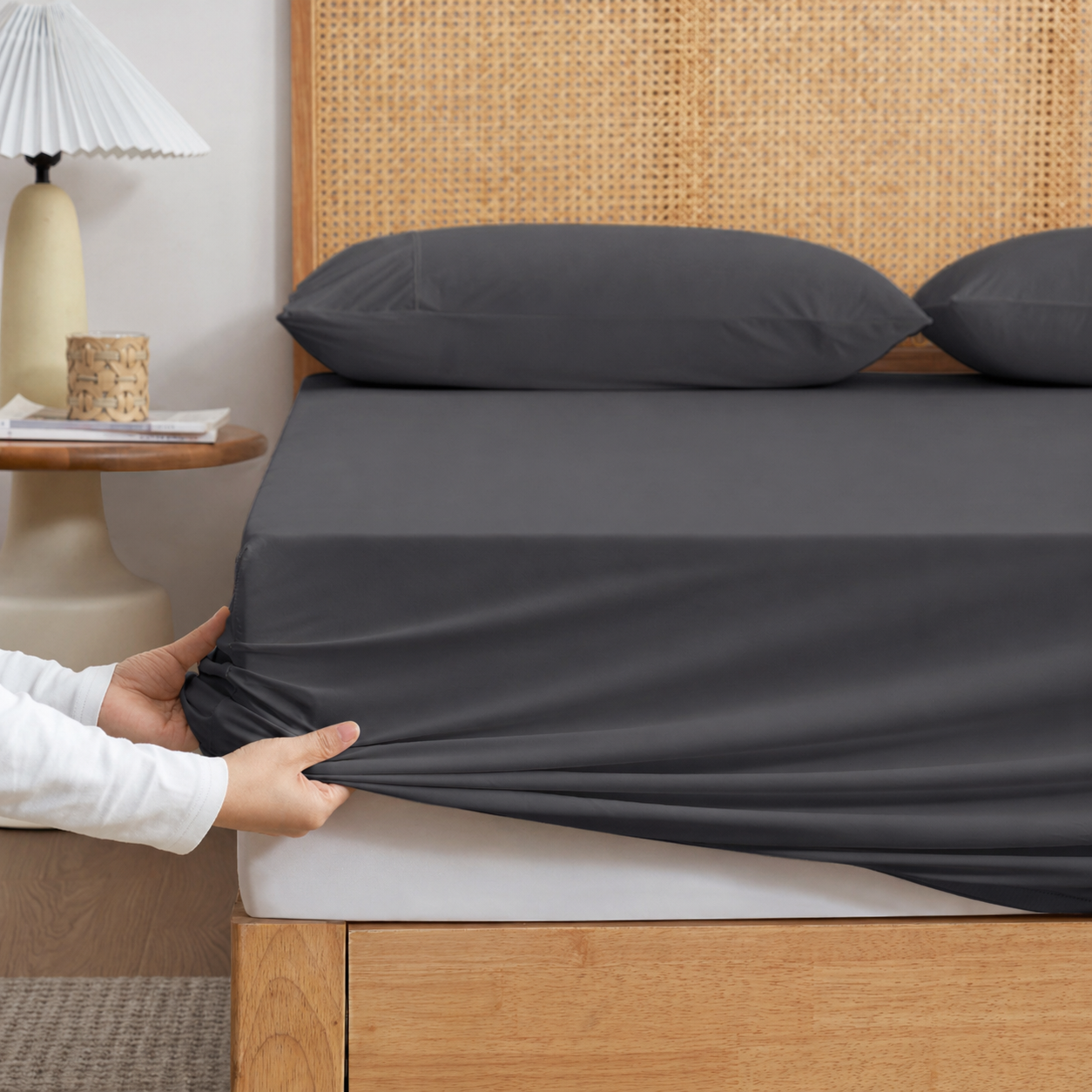 Cozy Bliss Grey-colored cooling fitted sheet set with pillowcases front view. #Color_Charcoal Grey