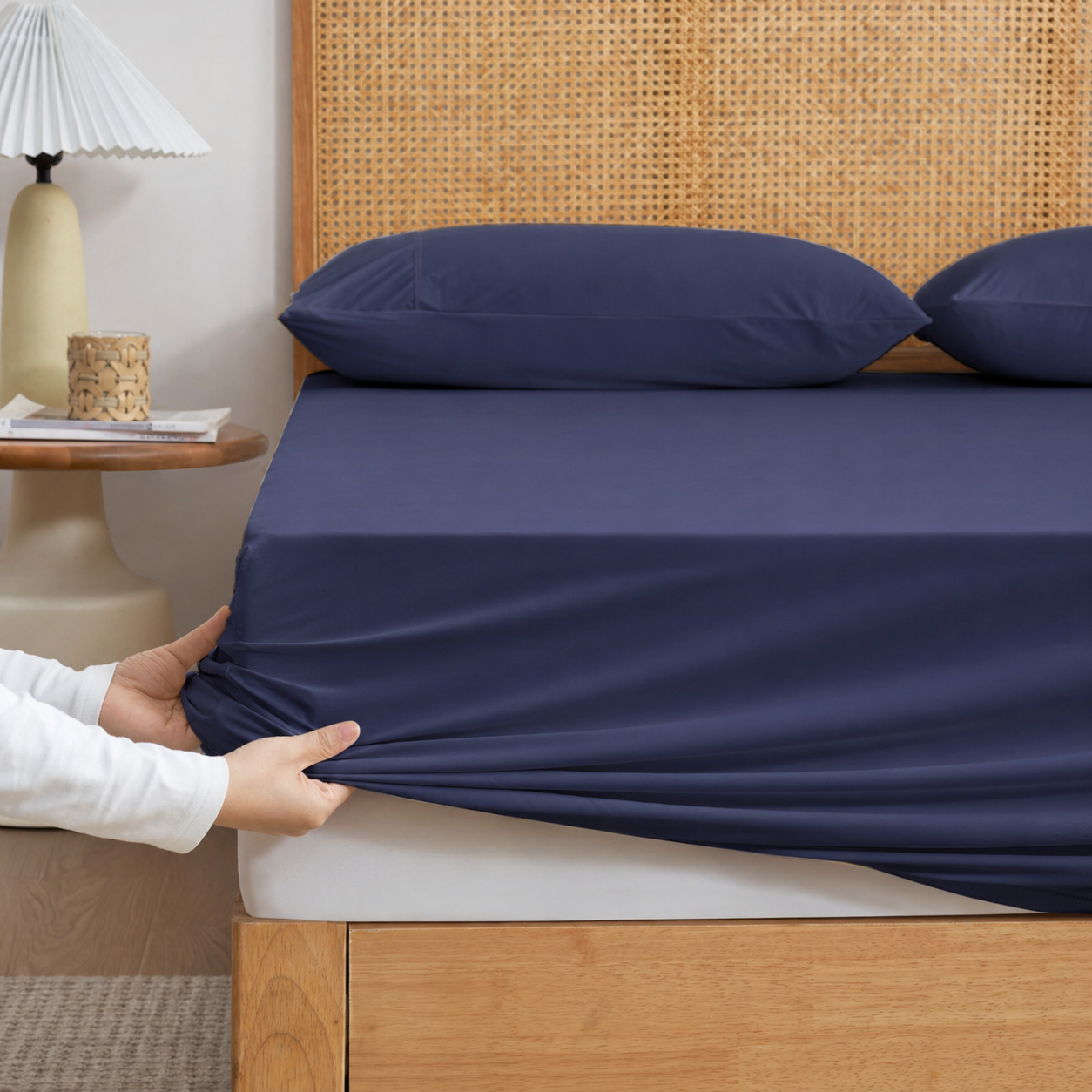 Cozy Bliss Blue-colored cooling fitted sheet set with pillowcases front view. #Color_Navy Blue