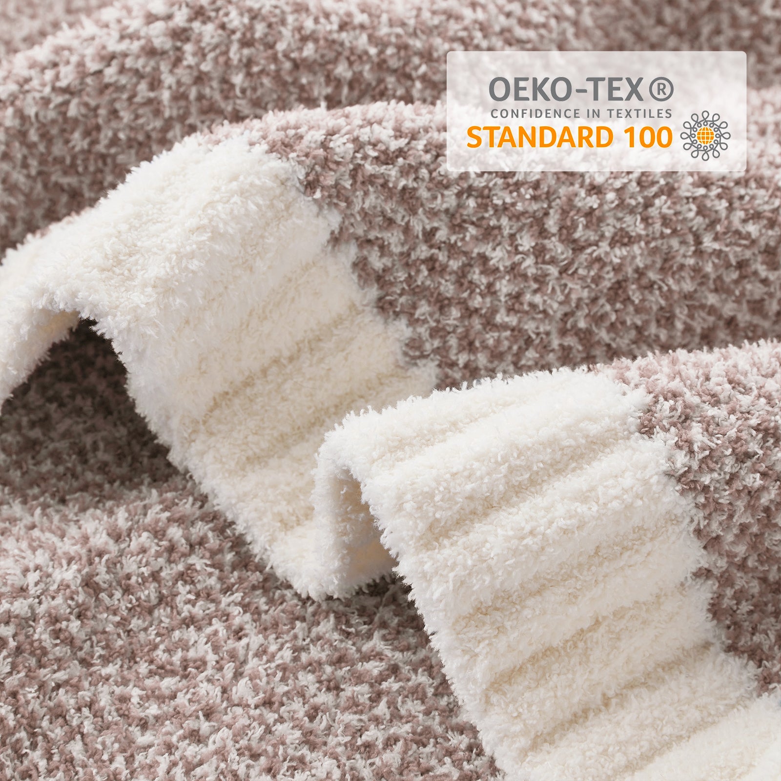 Close-up of Heather Feather Yarn Throw Blanket in Brown showcasing plush texture and OEKO-TEX STANDARD 100 certification. #color_Light Brown