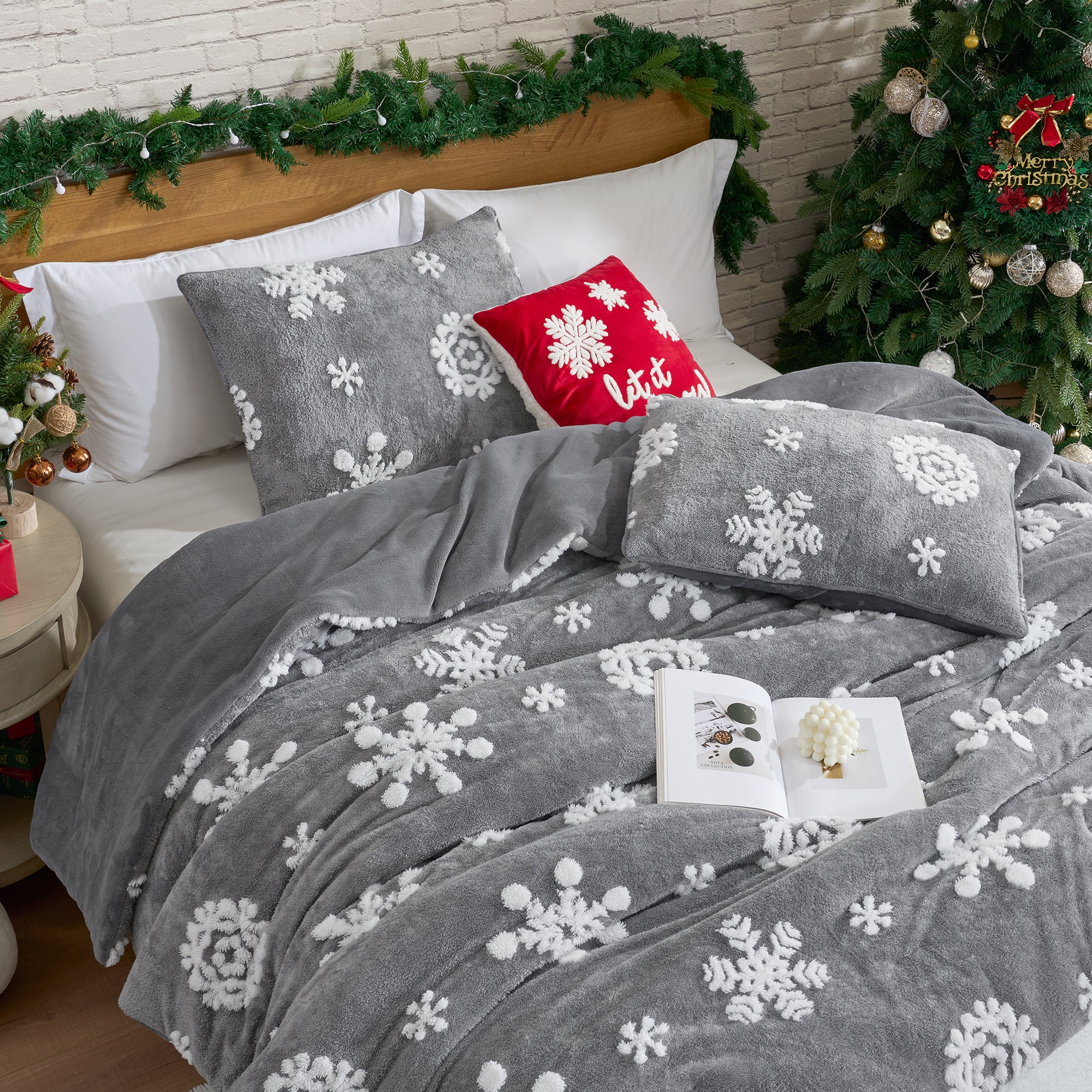 Gray snowflake patterned bedding set on a bed with Christmas decorations. #Color_Snowflake Grey