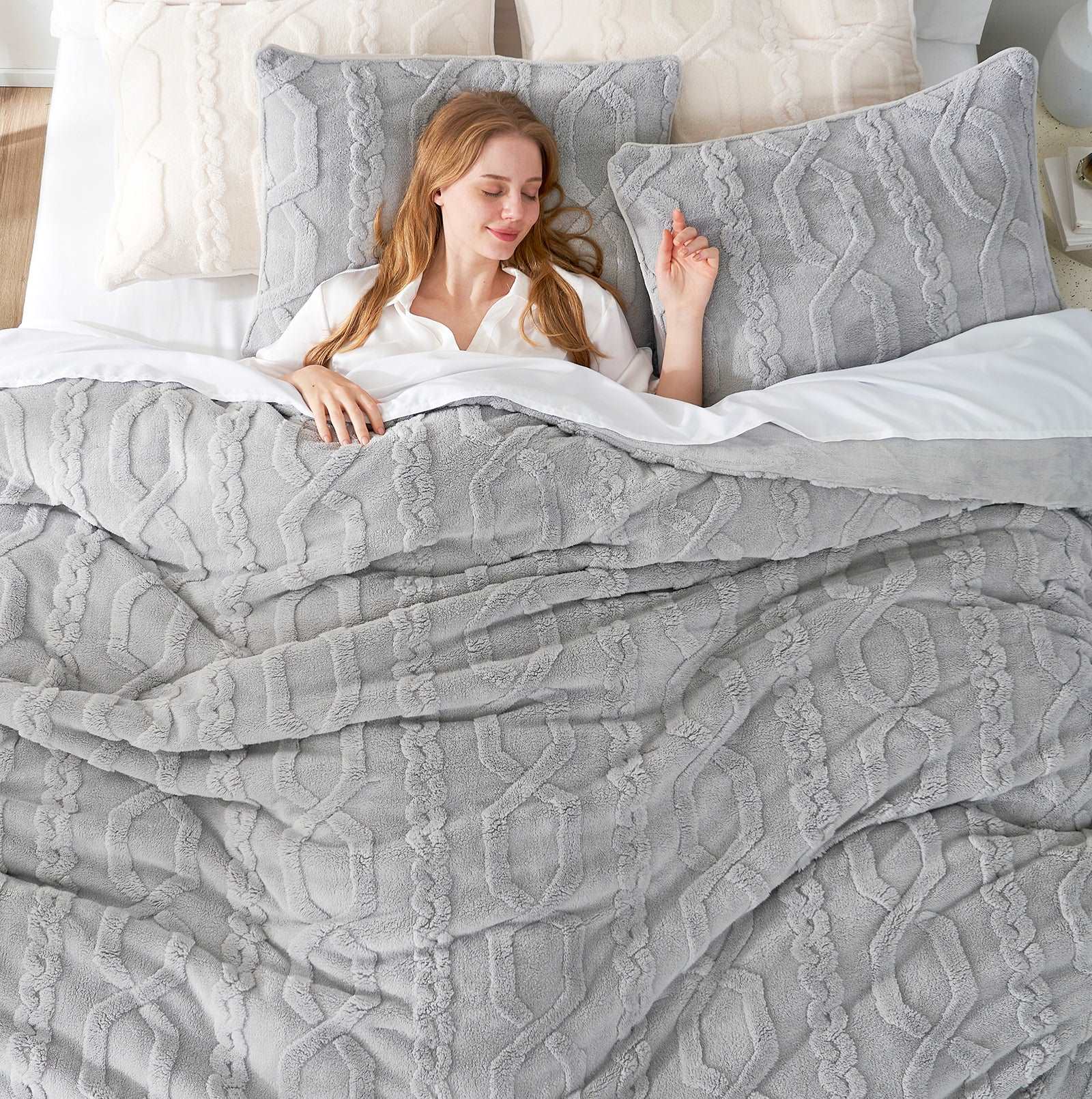 Woman sleeping on Cozy Bliss gray sherpa comforter set #color_Light Grey