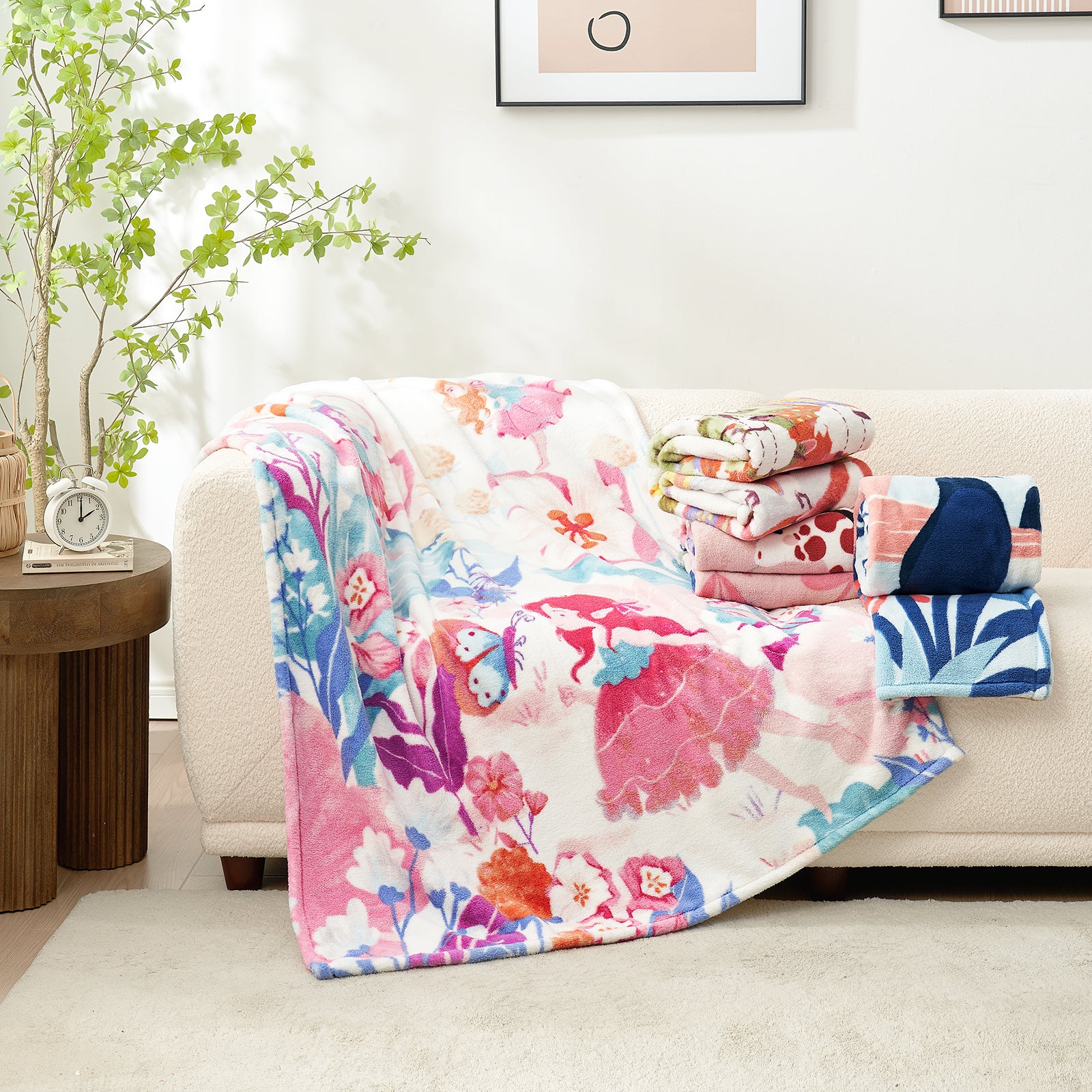 Colorful floral-patterned blanket on a couch in a living room setting. #color_Garden Diary