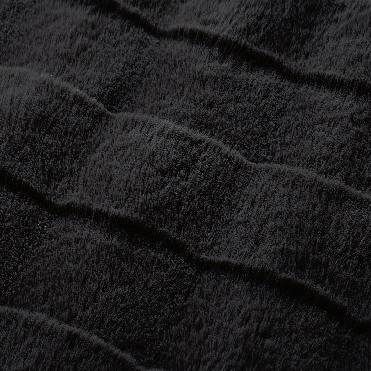 Close-up of a black cross-striped faux fur throw blanket fabric. #Color_Black