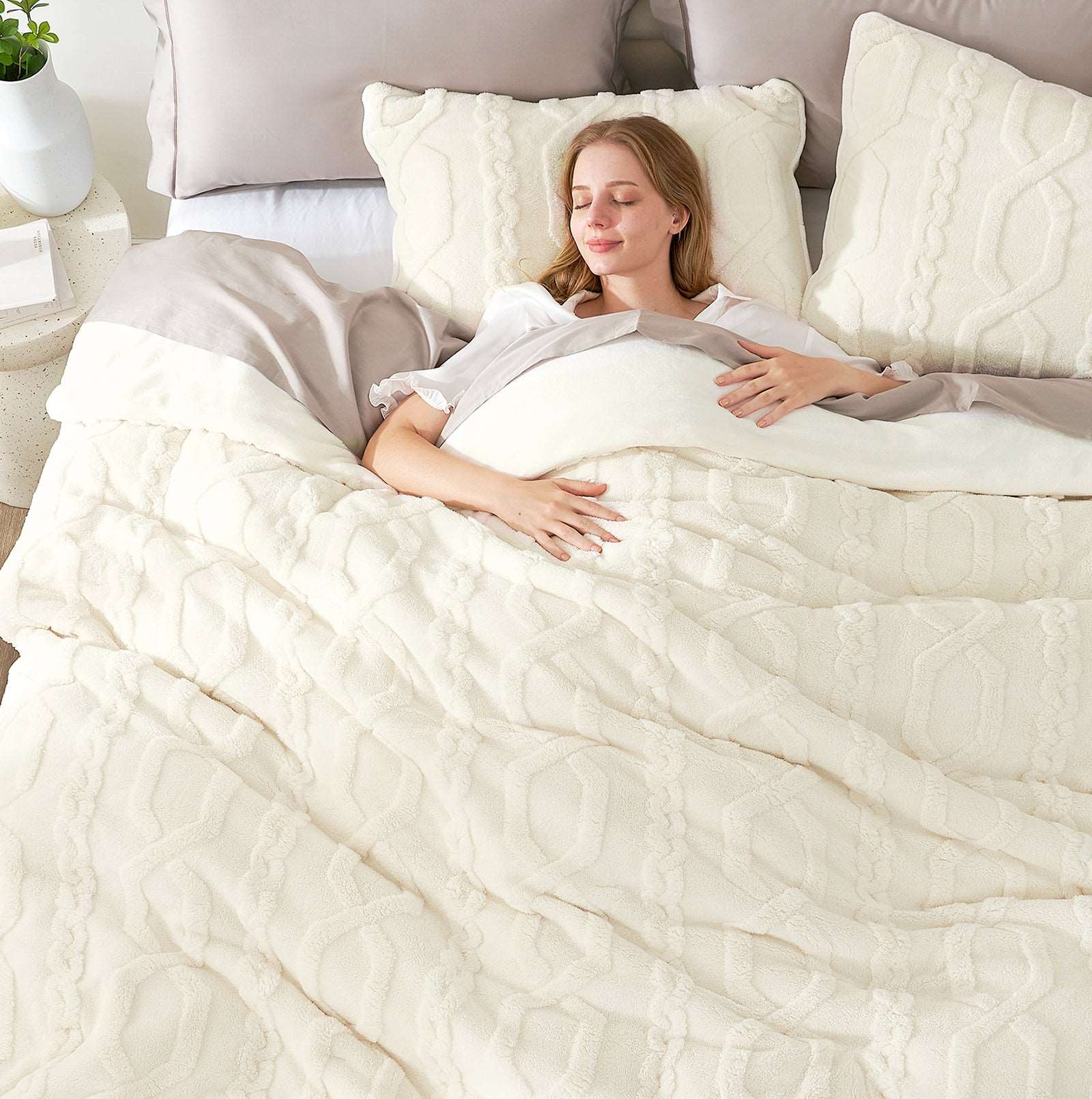 Woman sleeping on cozy bedding with Jacquard Boho Texture Sherpa Bed Set #color_Cream
