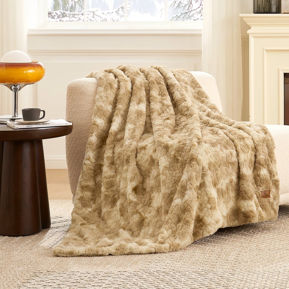 Premium Brushed Faux Fur Throw Blanket draped over a modern accent chair with elegant plush texture #color_Tie-dye Beige