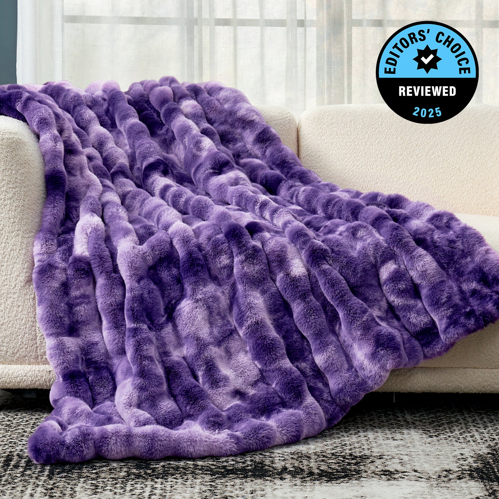 Purple textured blanket draped over a couch with 'Editors' Choice' badge in the corner. #Color_TIe-dye Purple