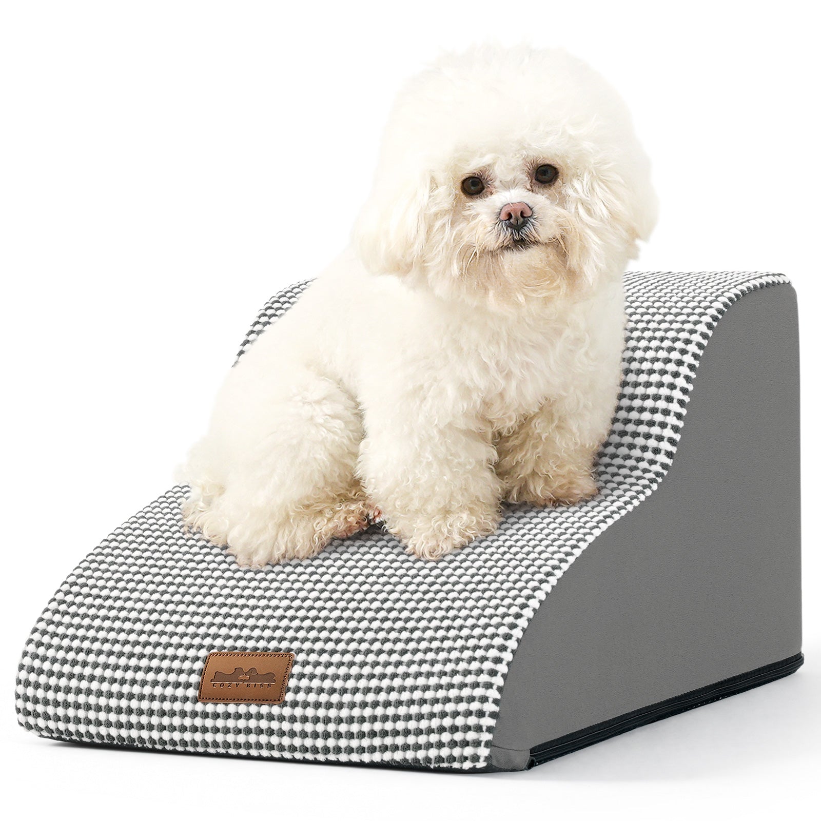 Small white dog sitting on a checkered pet ramp with a white background#color_Black White