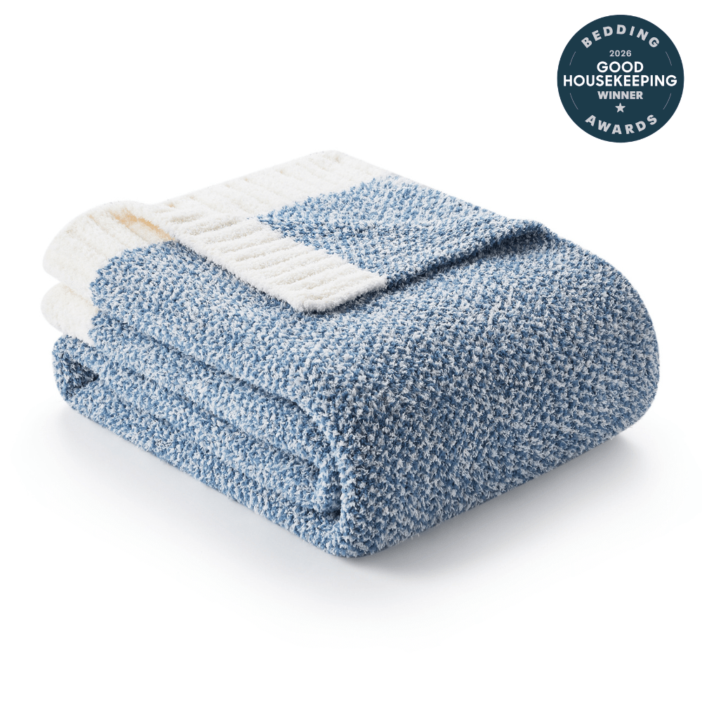 Heather Feather Yarn Throw Blanket in Misty Blue front view, neatly folded to showcase its soft texture. #color_Misty Blue