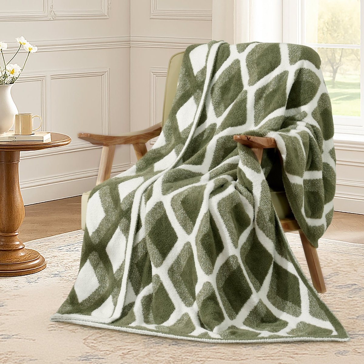 Diamond Feather Yarn Throw Blanket in Green draped over an armchair, showcasing soft feather yarn texture and diamond pattern design. #color_Oliver Green