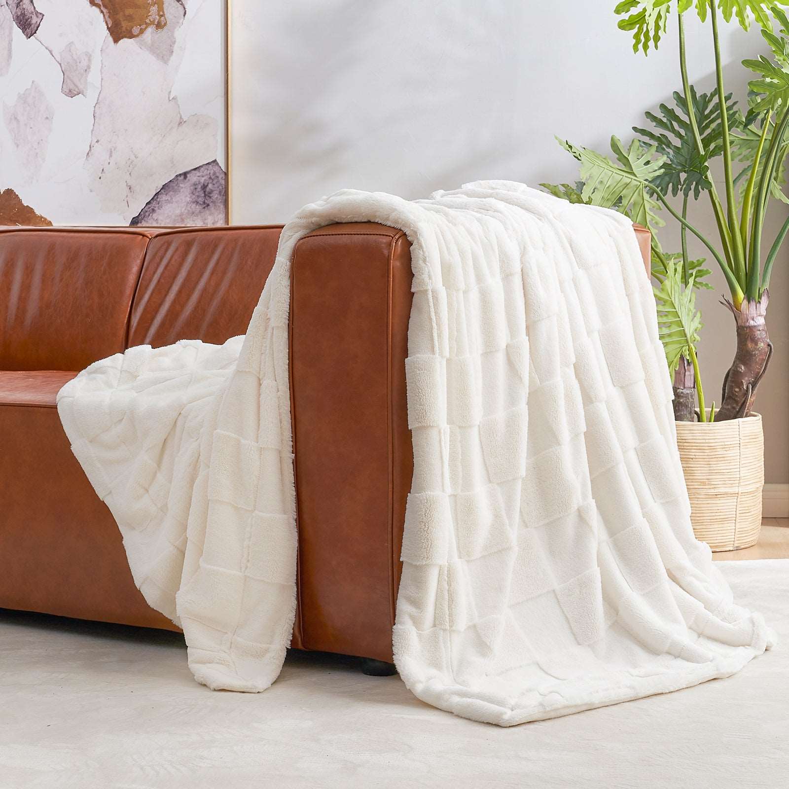 Cream checkboard faux fur blanket on brown leather sofa, home decor #color_Ivory