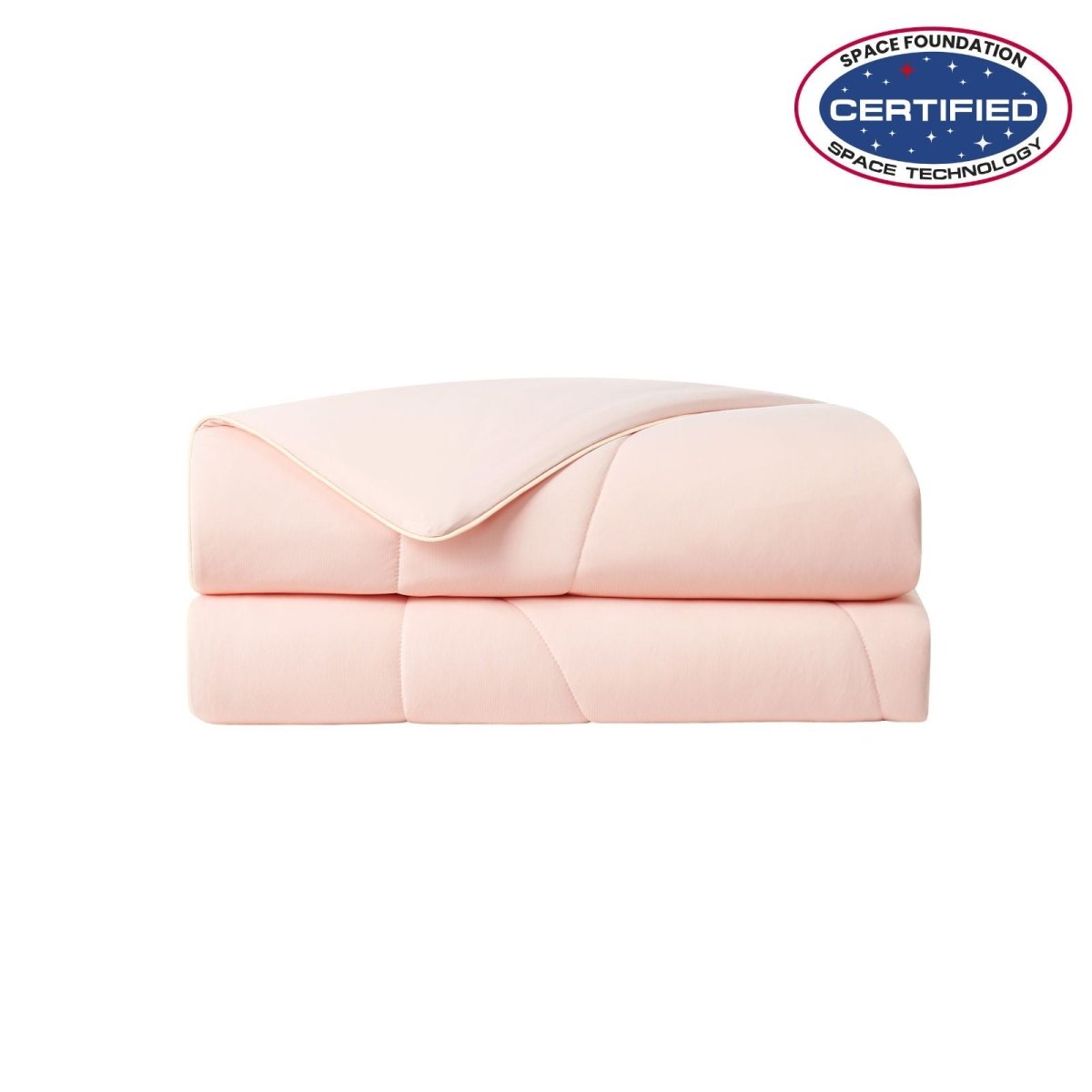 Folded pink cooling comforter with Space Foundation certification logo on a white background#color_Pink