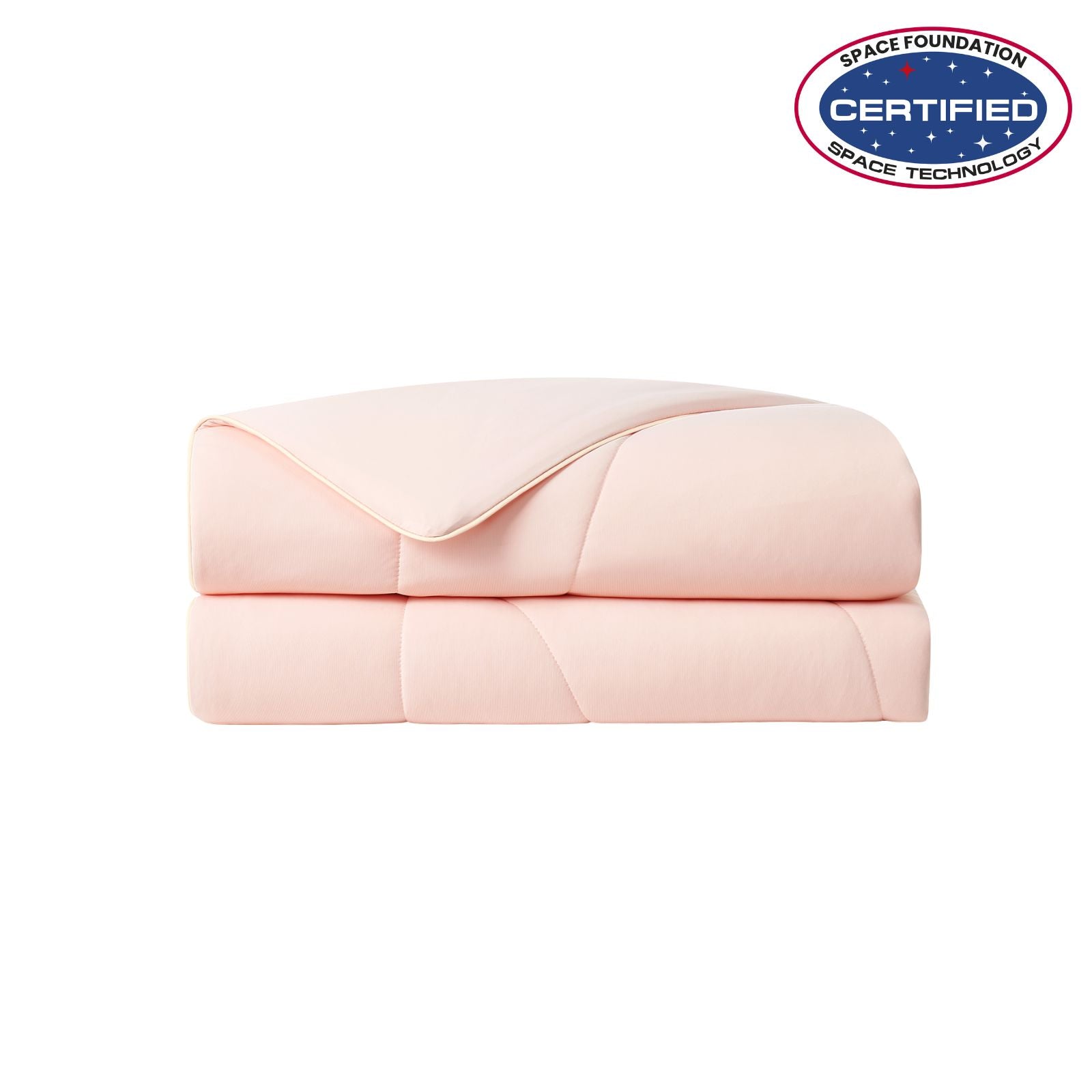 Folded pink cooling comforter with Space Foundation certification logo on a white background#color_Pink