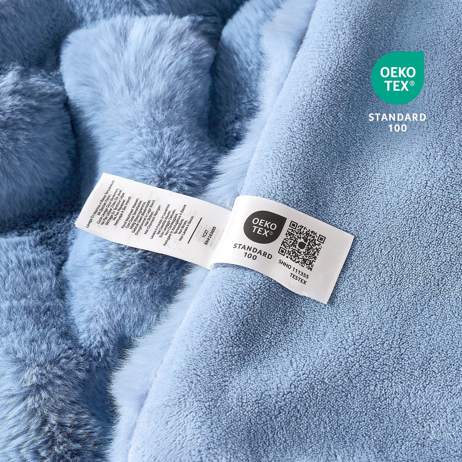 Close-up of OEKO-TEX certified faux fur misty blue blanket fabric. #Color_Misty Blue