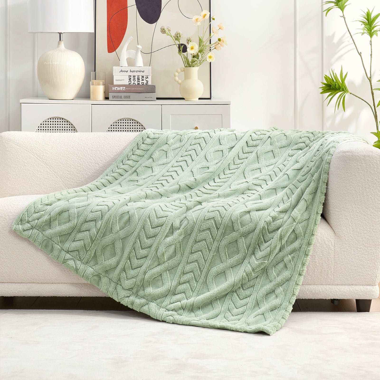 Green cable knit faux fur throw blanket on a sofa, cozy bedding #color_Sage Green