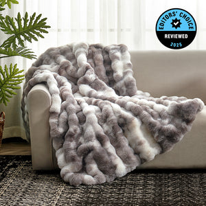 Fluffy gray and white blanket draped over a sofa with an 'Editors' Choice' badge in the corner. #Color_Tie-dye Taupe
