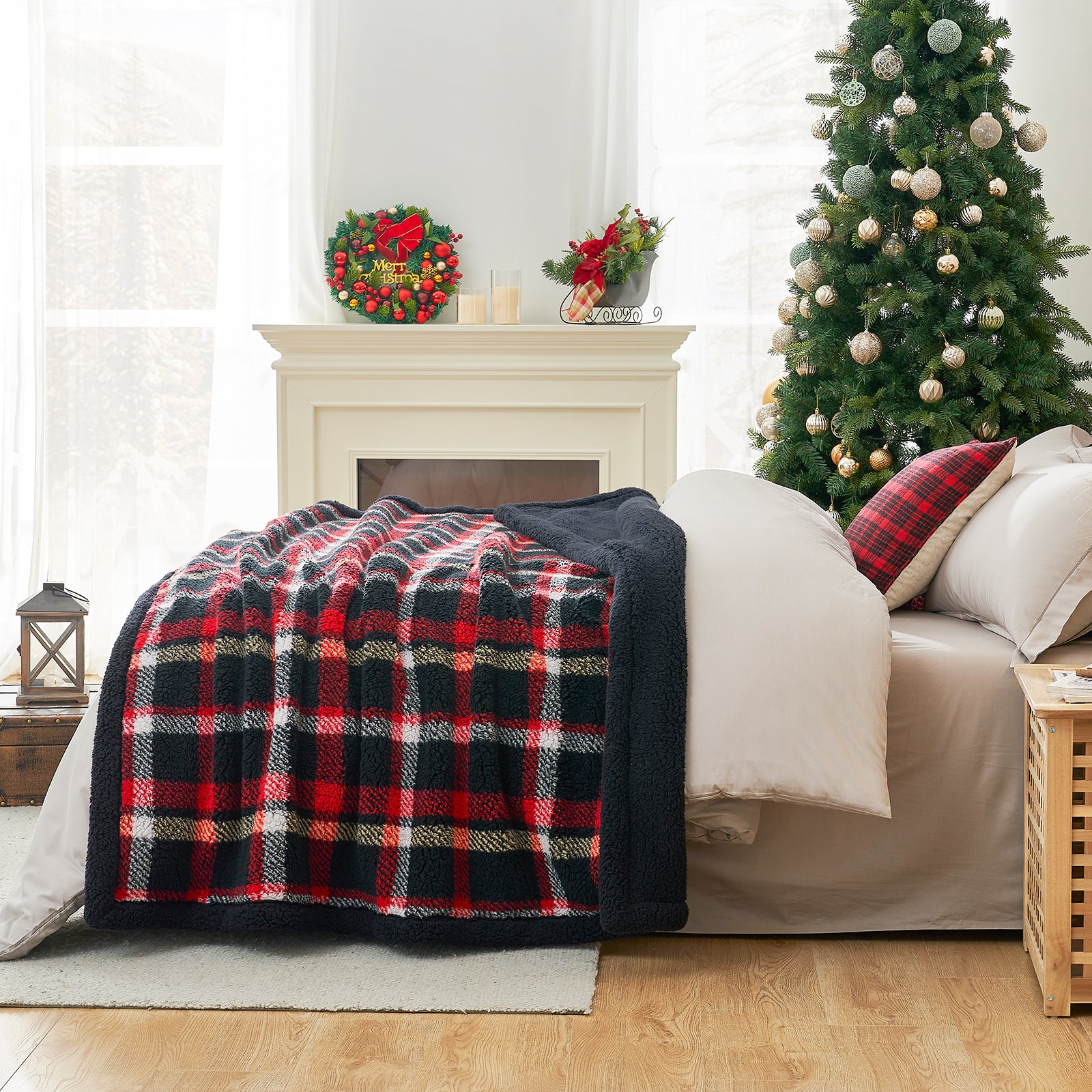 Cozy bedroom with plaid blanket, Christmas tree, and fireplace. #Color_Scotland Plaid Red