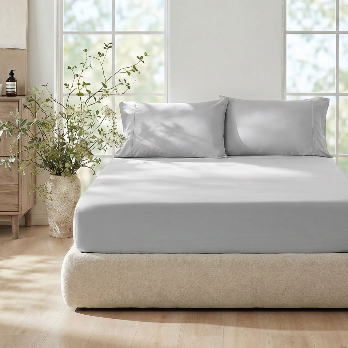 Cozy Bliss Light gray cooling sheet set with pillowcases on a bed in front view#Color_Light Grey