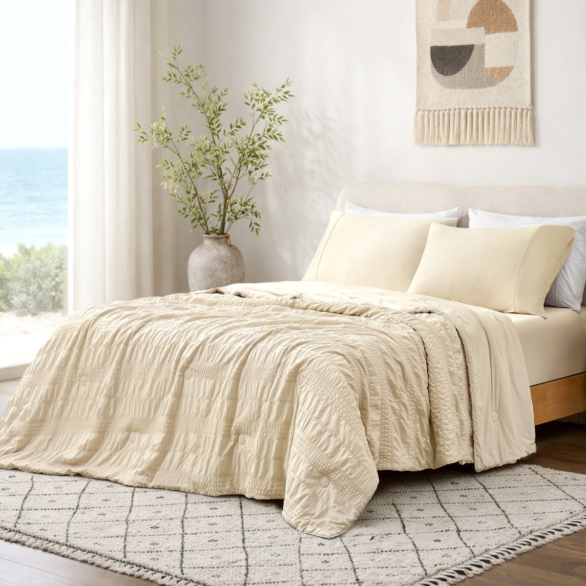 Cozy Bliss Seersucker cooling comforter in khaki, soft and breathable for cool sleep.#color_khaki
