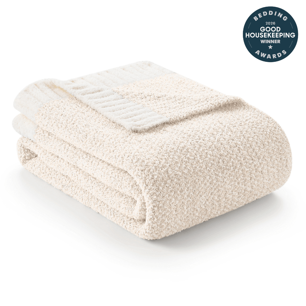 Heather Feather Yarn Throw Blanket in Ivory front view, neatly folded to showcase its ultra soft, fluffy texture and cozy feel. #color_Ivory