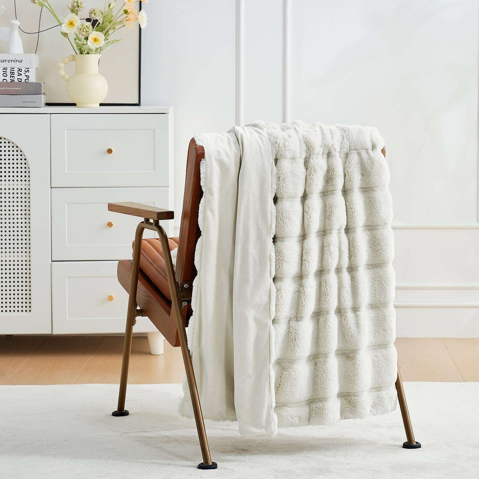 Cozy Bliss faux fur throw blanket draped over chair, home decor  #color_Beige