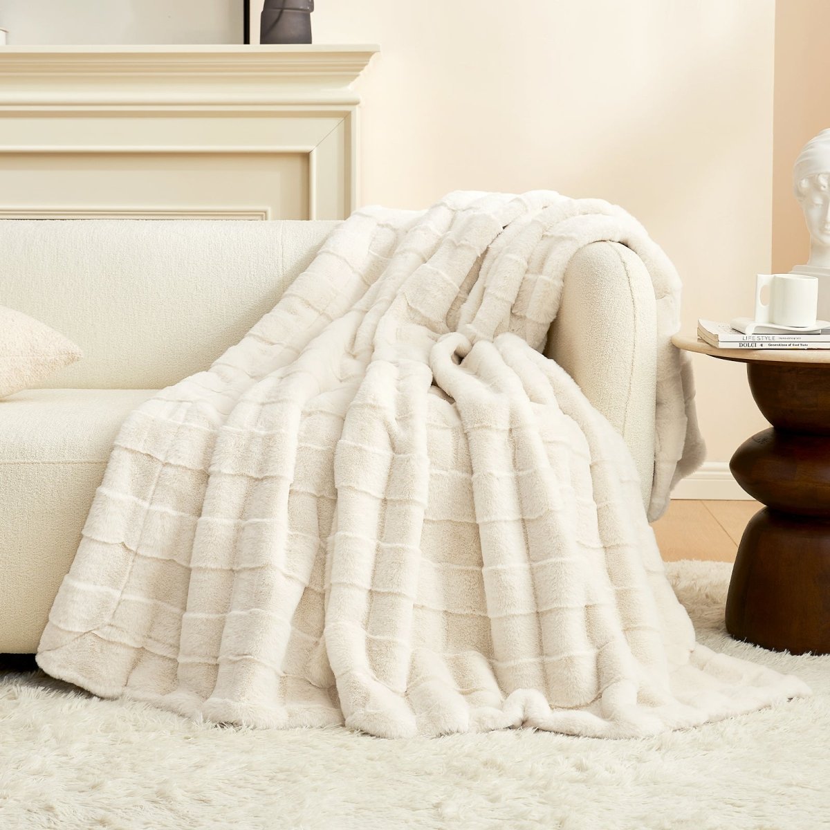 Cream white cross-striped faux fur blanket on sofa #color_Cream White