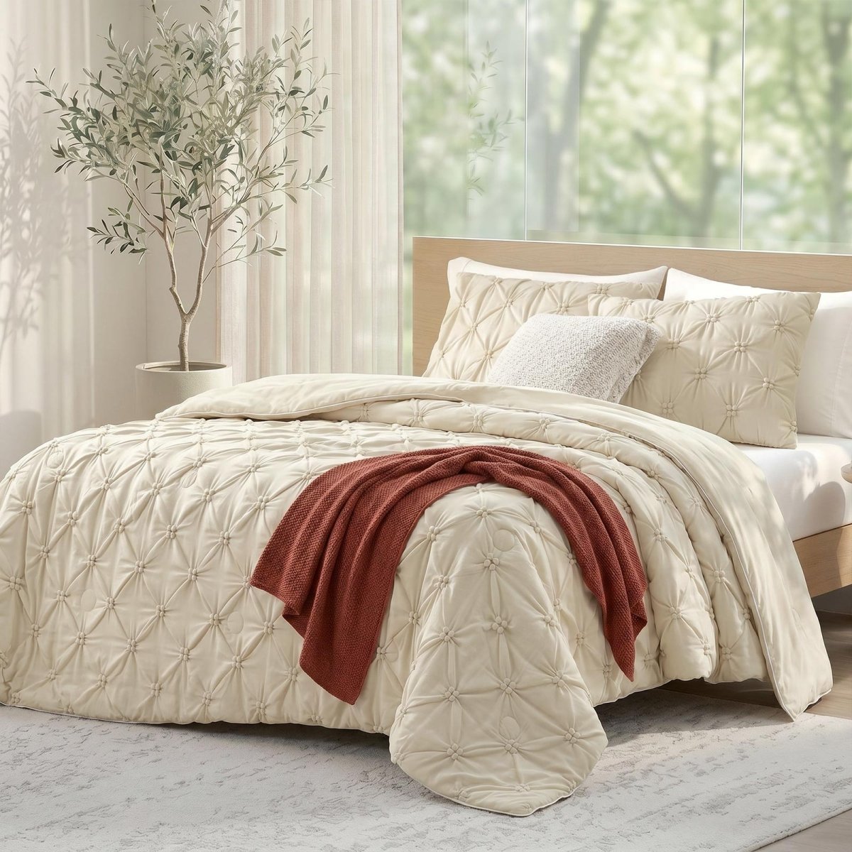 Cozy Bliss beige pintuck design cooling comforter on a bed, designed for hot sleepers and night sweats.#color_Beige