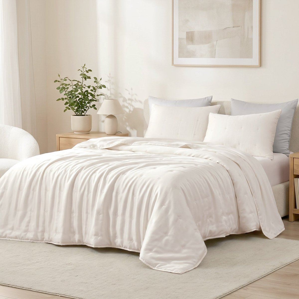 Cozy Bliss Tencel™ Lyocell Cooling Comforter in side view.#color_Off White