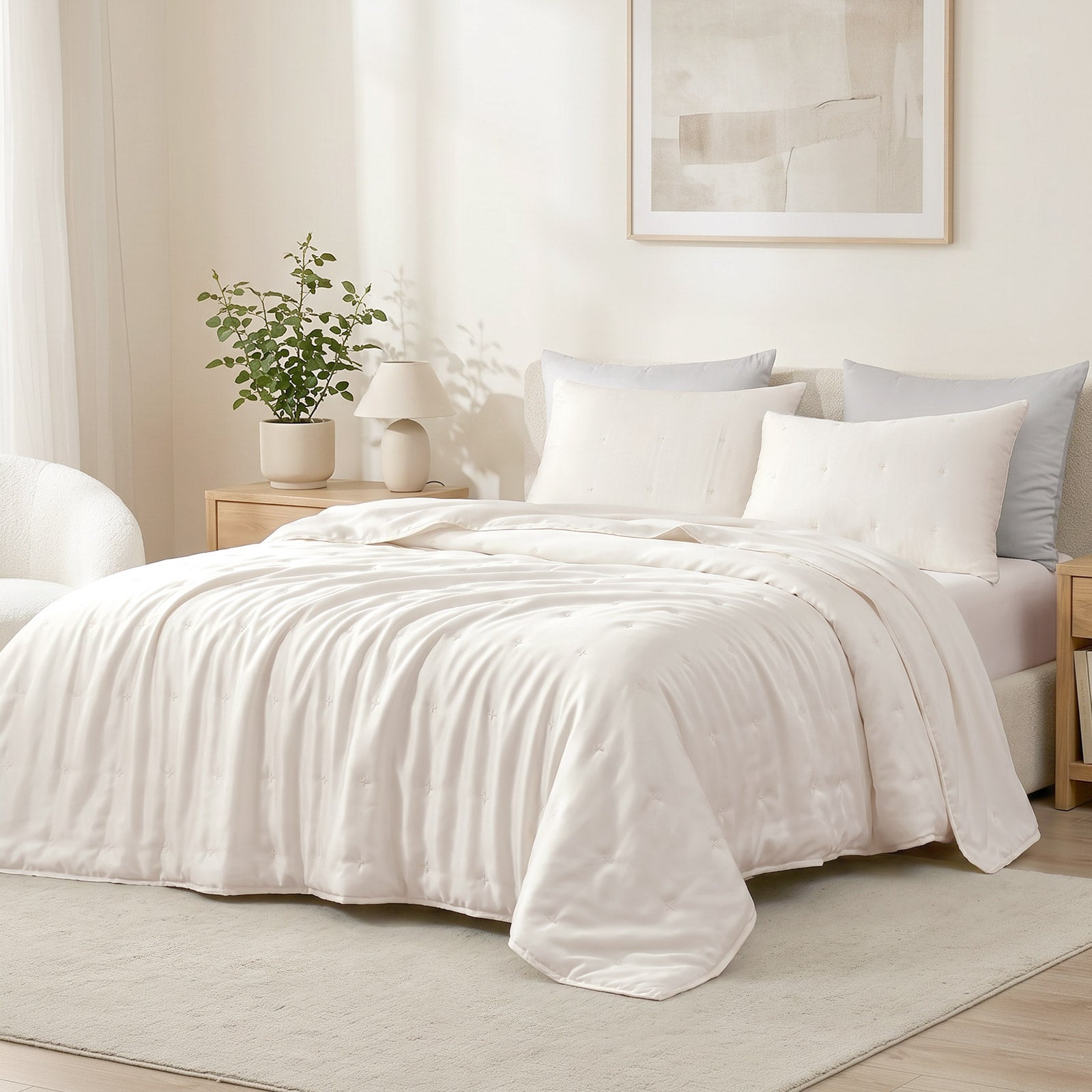 Cozy Bliss Tencel™ Lyocell Cooling Comforter in side view.#color_Off White