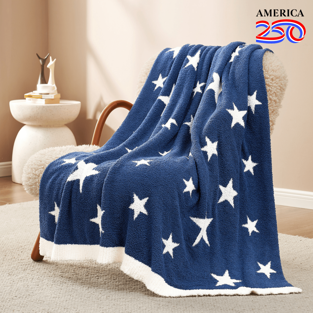 Reversible Star Feather Yarn Knit Throw Blanket in Navy Blue draped over an armchair, showcasing its ultra soft texture and stylish star pattern design. #color_Navy Blue