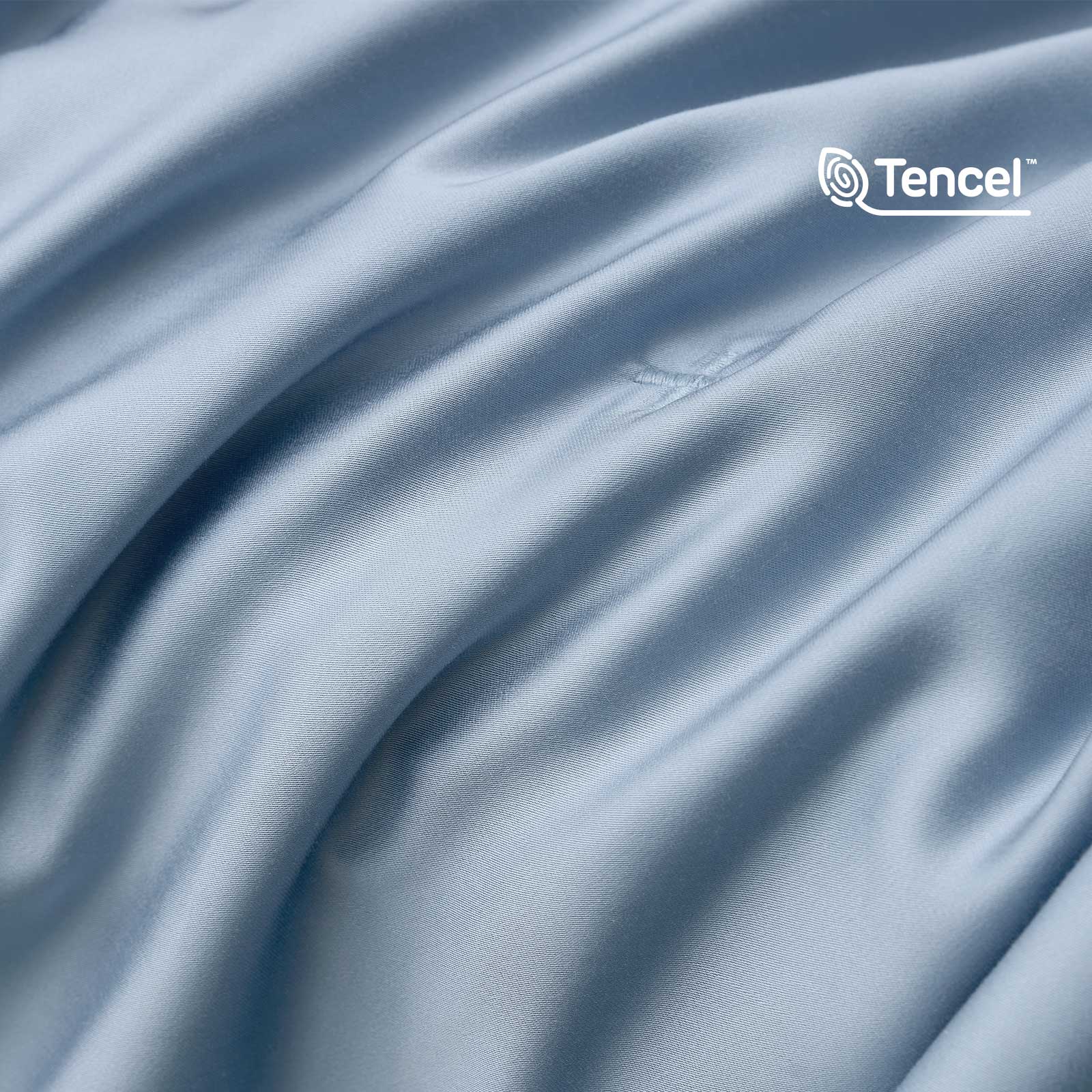 Close up of silky smooth Tencel™ lyocell cooling fabric with OKEO-TEX Standard 100 certification.#Color_Dark Blue