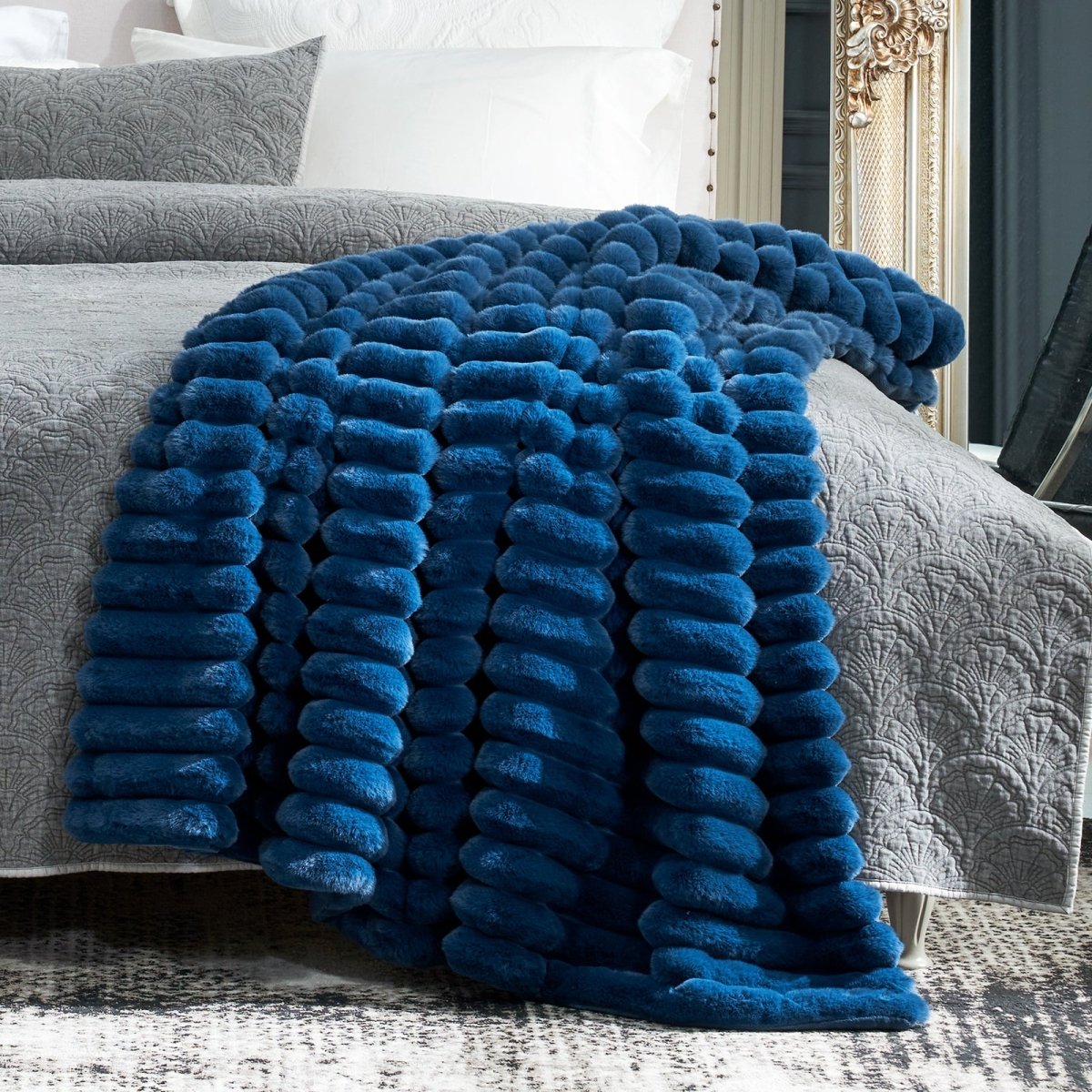 Cozy Bliss navy blue striped faux fur blanket on bed, soft and cozy, premium bedding. #color_Navy Blue