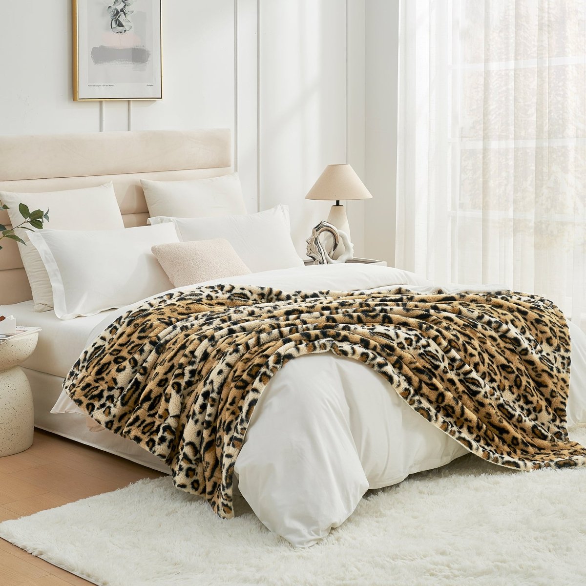 Leopard print milkyplush throw blanket in Brown Leopard layered on a bed, creating a warm and stylish bedroom look #color_Brown Leopard