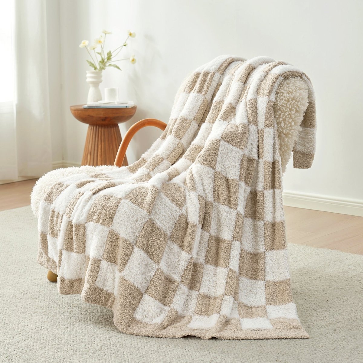 Checkered Faux Fur Feather Yarn Throw Blanket in Beige & White draped over an armchair, adding warmth and a cozy touch to your living space. #color_Beige & White