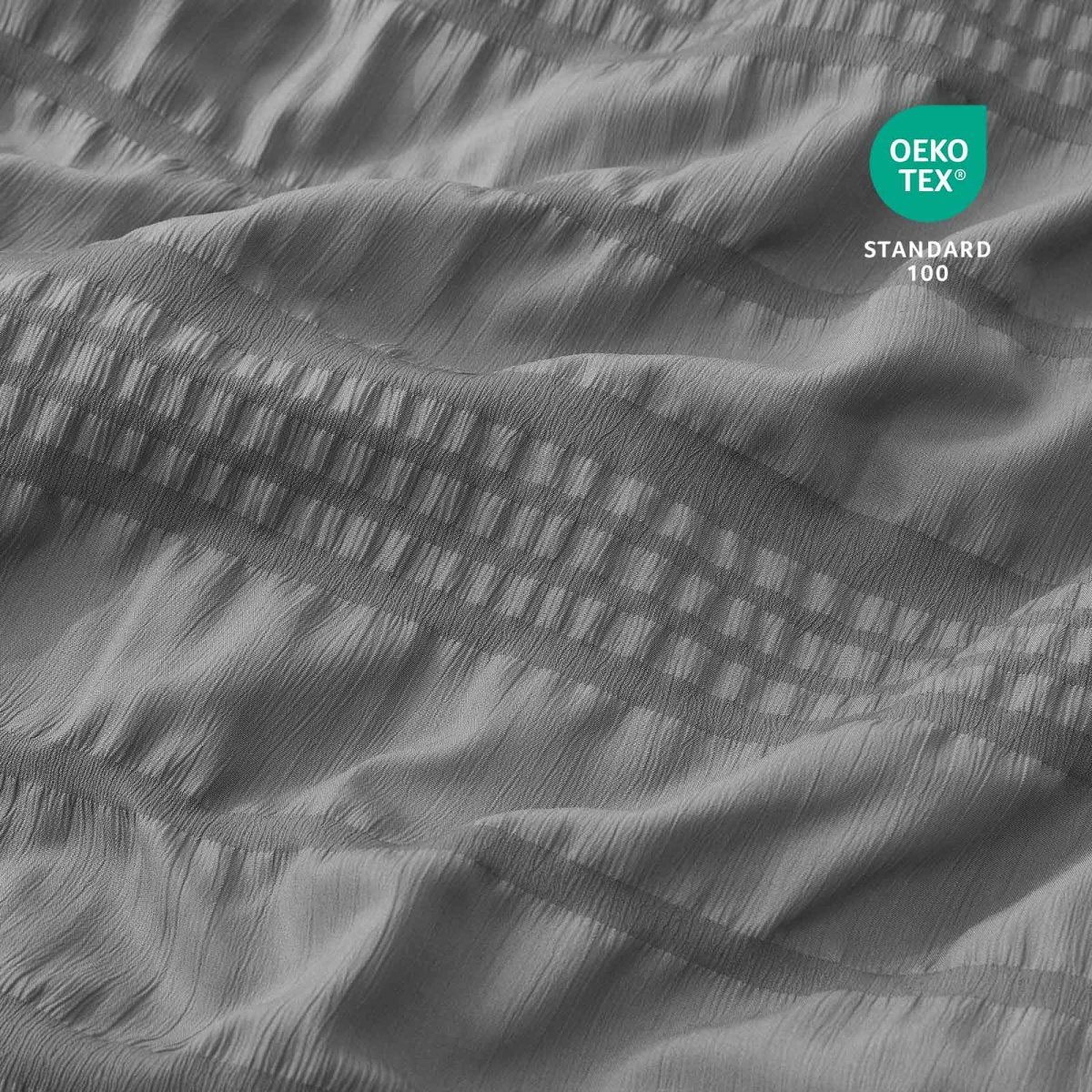 Close-up of Cozy Bliss cooling fabric with OEKO-TEX Standard 100 certification.#color_Dark Grey