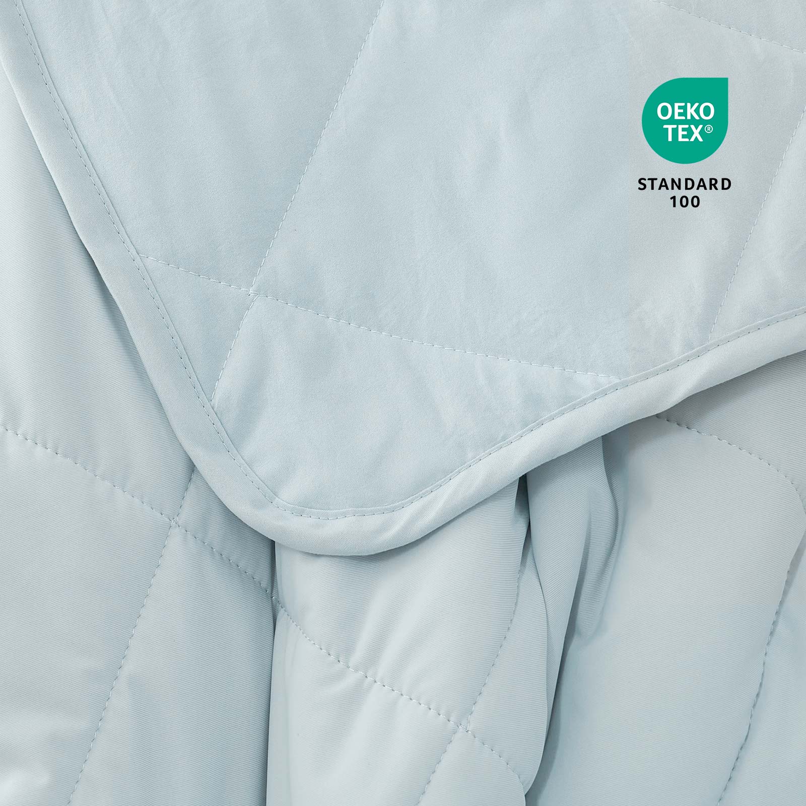 Close-up of Cozy Bliss cooling blanket with Oeko-Tex certification for safe materials #Color_Cool Blue