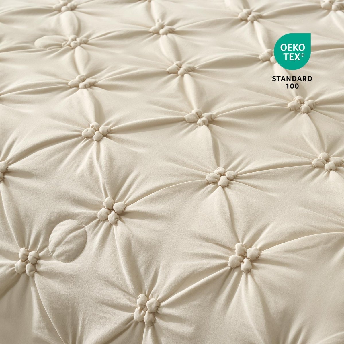 Close-up of Cozy Bliss OEKO-TEX Standard 100 Certified fabric and pintuck design.#color_Beige
