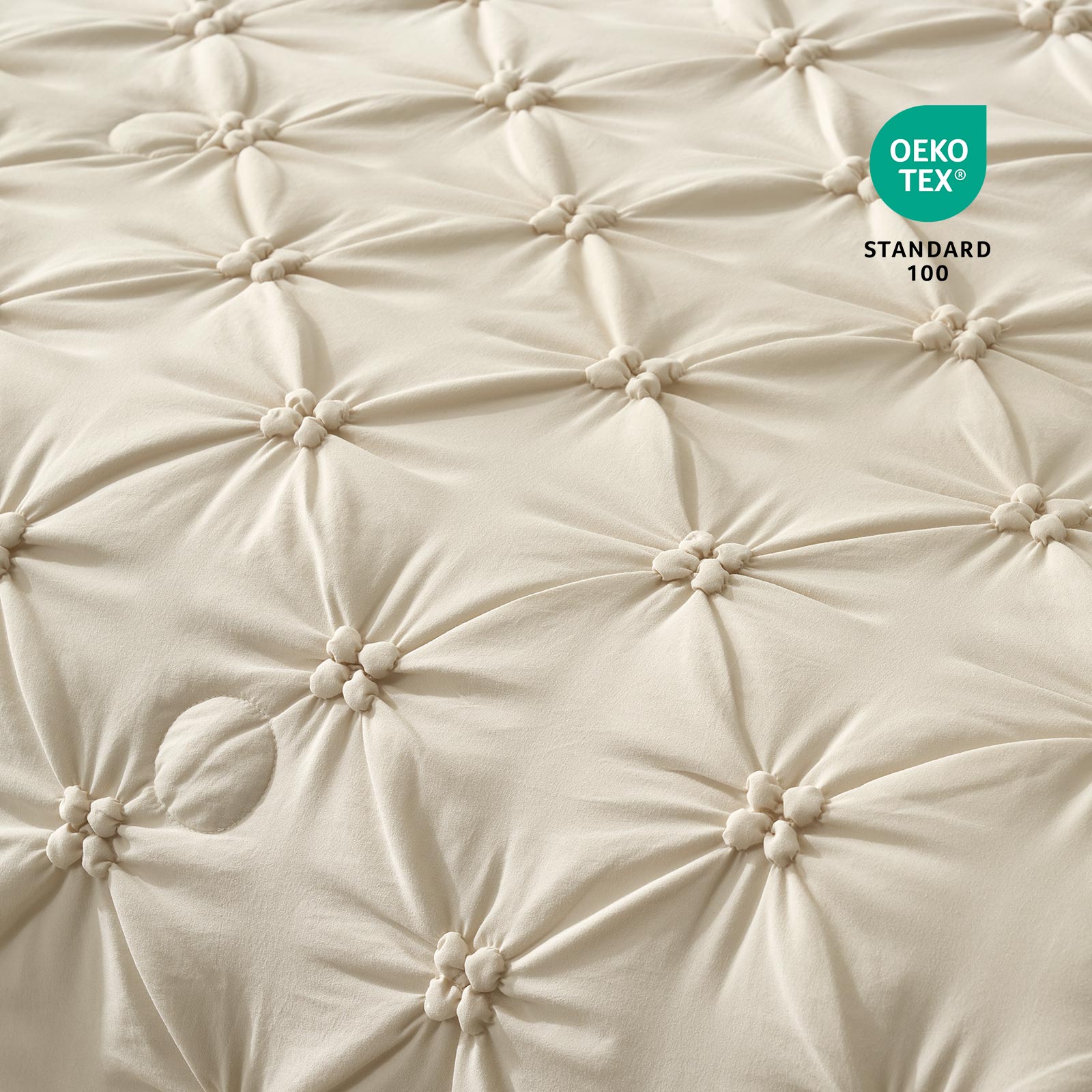 Close-up of Cozy Bliss OEKO-TEX Standard 100 Certified fabric and pintuck design.#color_Beige