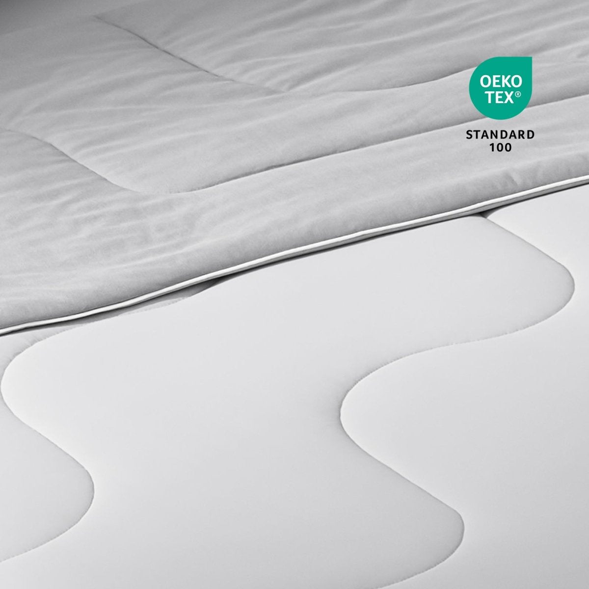 Close up of Cozy Bliss Sorona® Natural Fiber Ultra Breathable Cooling fabric.#color_Light Grey