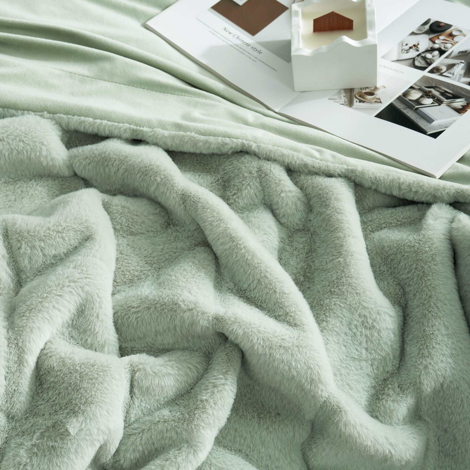 Close-up of a Cozy Bliss fuzzy green throw blanket  #color_Sage Green